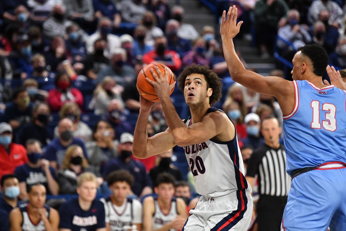 Gonzaga forward Kaden Perry (20) looks for an opening against Lewis-Clark State in an exhibition game on Nov 5, 2021.  (Tyler Tjomsland / The Spokesman-Review)