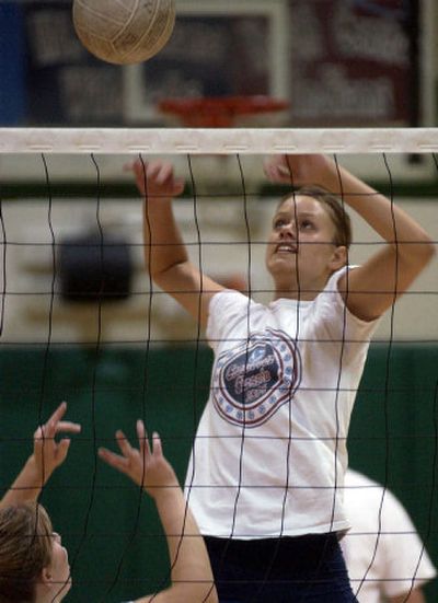 
East Valley High School senior Rachel Bonertz spikes the ball during practice. Bonertz is a starter for the Spokane Splash U-17 club team.
 (Liz Kishimoto / The Spokesman-Review)