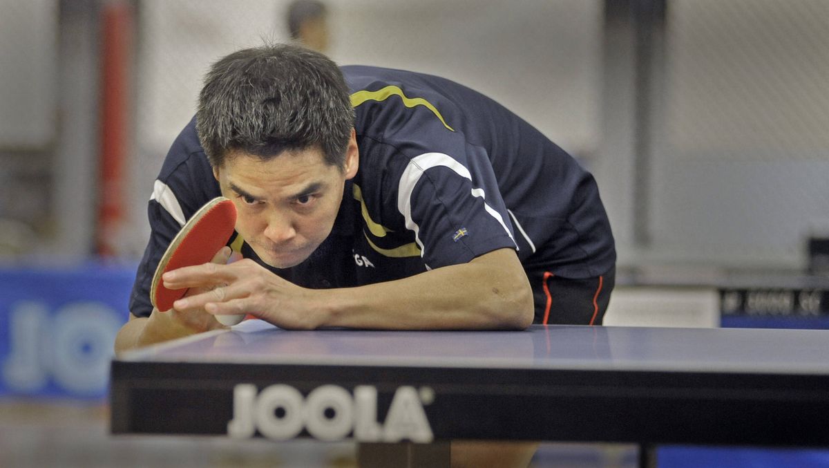 Sakda Timsuwan, of Seattle, sets up for a serve during his open classification match Saturday at the Spokane Ultimate Open Table Tennis Tournament at the HUB Sports Center in Liberty Lake. Competition will continue through this afternoon. (Christopher Anderson)