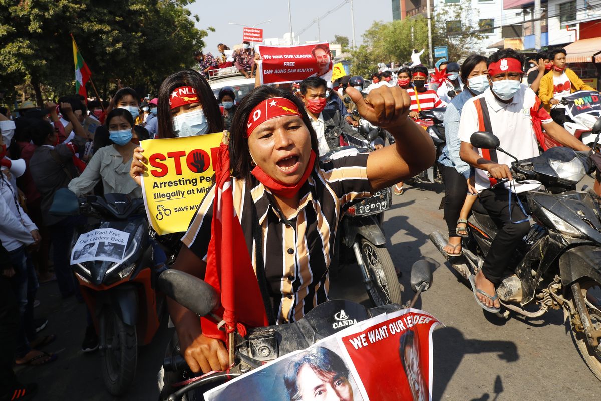 Anti-coup protesters join a rally on motorcycles in Mandalay, Myanmar, Saturday, Feb. 13, 2021. Mass street demonstrations in Myanmar have entered their second week with neither protesters nor the military government they seek to unseat showing any signs of backing off from confrontations.  (STF)