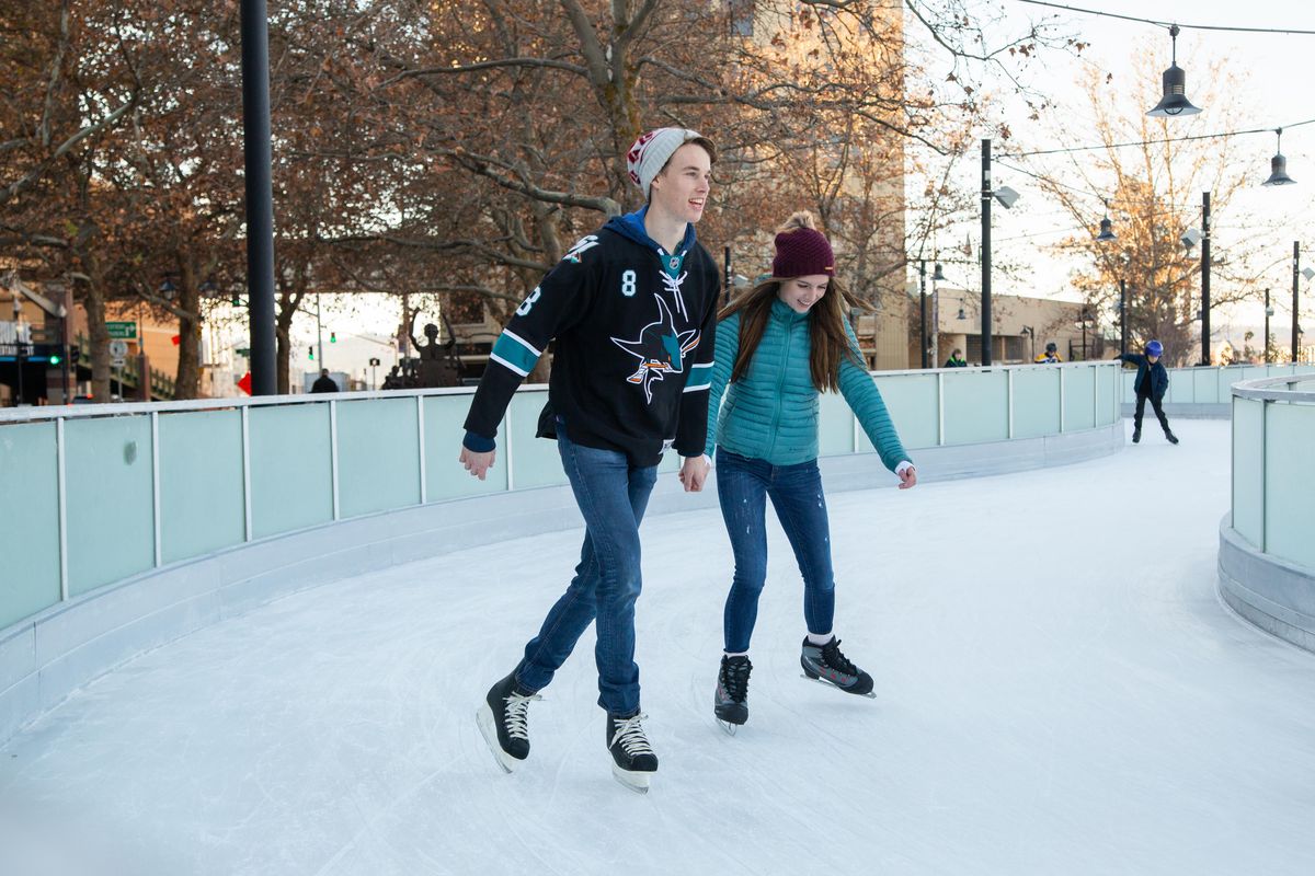 Curtis and Tatiana Hunter skate on the first day that the Riverfront Skate Ribbon is open this season on Nov. 17, 2018. The ice ribbon is in its second year of use and is open from 11 a.m. to 9 p.m. Sundays through Thursdays and 11 to 10 p.m. on Fridays and Saturdays. Libby Kamrowski/ THE SPOKESMAN-REVIEW (Libby Kamrowski / The Spokesman-Review)