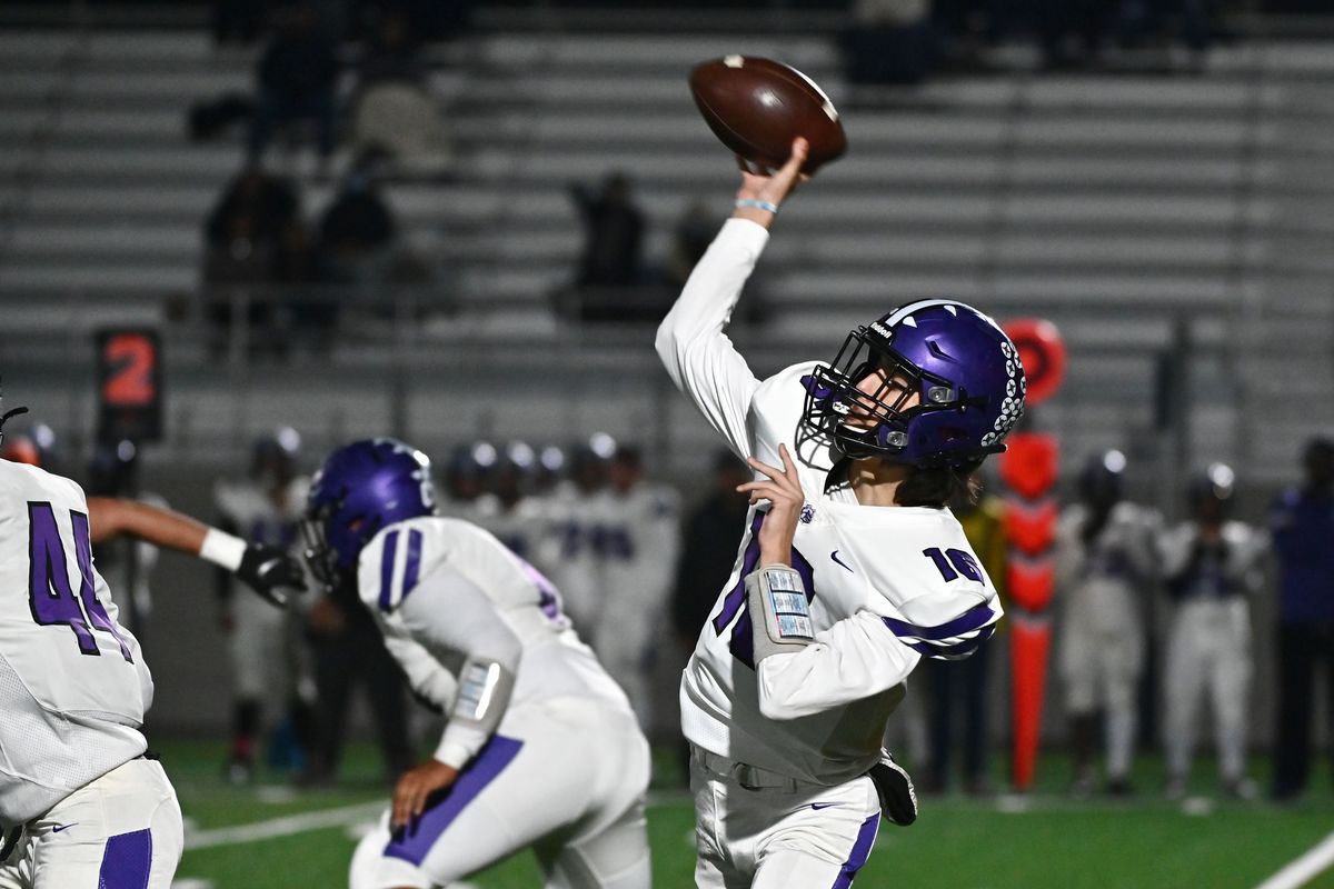 Pasco Bulldogs Kaden Watanabe (16) throws a pass against the Lewis and Clark Tigers during a high school football game at Union Stadium on Tuesday, Nov. 2, 2021 in Spokane WA. (James Snook-for Spokesman Review)  (James Snook)