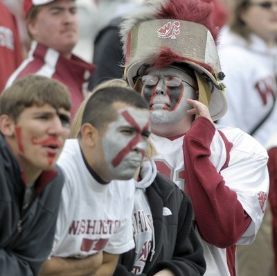 There is no disguising the fact that Cougar fans are down and out about their football team.  (Christopher Anderson / The Spokesman-Review)