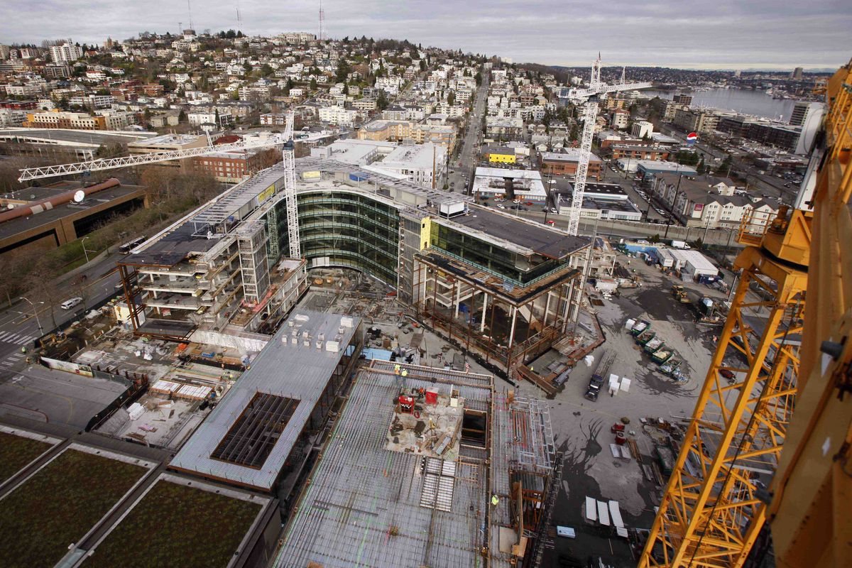 This Jan. 6  photo shows one of two buildings in the Gates Foundation complex from atop a  crane. The design is meant to reflect the foundation’s  mission to improve the lives of the poor and inspire visitors to be generous within their communities. (Elaine Thompson / Associated Press)