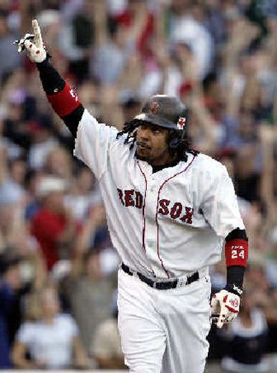 
Manny Ramirez rounds the bases after his three-run home run Sunday.
 (Associated Press / The Spokesman-Review)