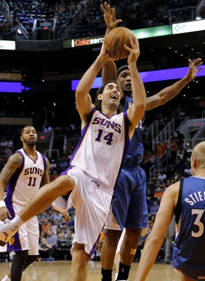 Suns' Luis Scola had 17 points, 12 rebounds but Phoenix came up well short, losing to Minnesota 117-86. (Associated Press)