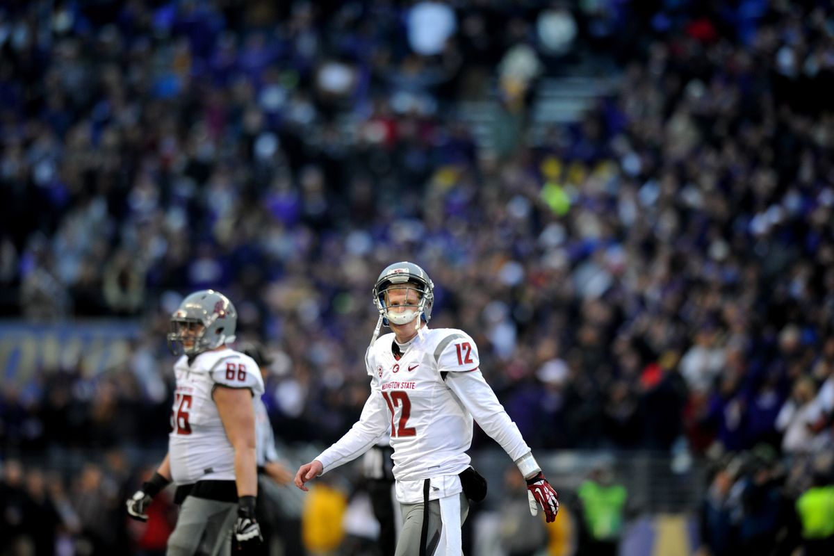 Cougars QB Connor Halliday (12) knows it’s over after second interception. (Tyler Tjomsland)