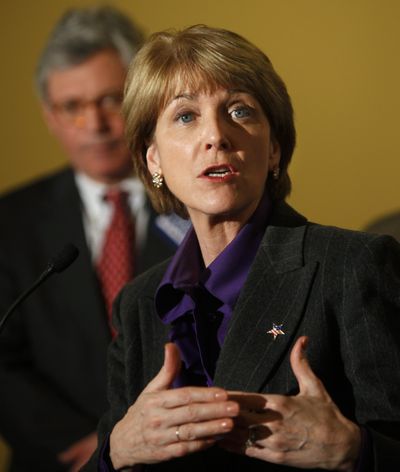 Martha Coakley talks with reporters Thursday during a campaign stop  in New Bedford, Mass. (Associated Press)