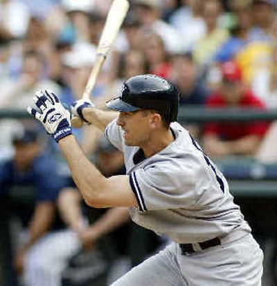 Toronto Blue Jays first baseman John Olerud swings through a pitch