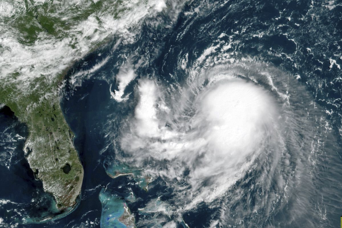 This OES-16 East GeoColor satellite image taken Friday, Aug. 20, 2021, at 11:40 a.m. EDT., and provided by NOAA, shows Tropical Storm Henri in the Atlantic Ocean. Henri was expected to intensify into a hurricane by Saturday, the U.S. National Hurricane Center said. Impacts could be felt in New England states by Sunday, including on Cape Cod, which is teeming with tens of thousands of summer tourists.  (HOGP)