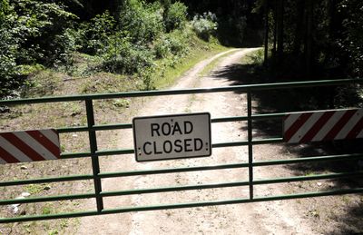 A gate blocks the road to the Brewer Mountain Route, one of four routes that are closed to motorists but which forest managers plan to open for disabled hunters who obtain special access permits. (Dan Pelle / The Spokesman-Review)