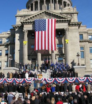 A color guard marches up the state capitol steps at the close of formal inauguration ceremonies Friday in Boise. (Betsy Russell)