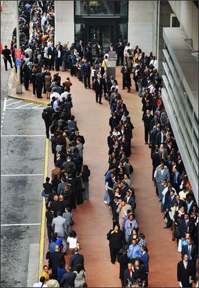 Thousands of people turned out Wednesday for a federal government job fair at the Atlanta Federal Center in downtown Atlanta. The fair, sponsored by the US Equal Employment Opportunity Commission's Atlanta District, was for jobs with federal agencies such as Justice, Labor, Commerce, Social Security, FBI, and Food and Drug, among others. (AP Photo/Journal Constitution, Rich Addicks) (February 11, 2009) (The Spokesman-Review)