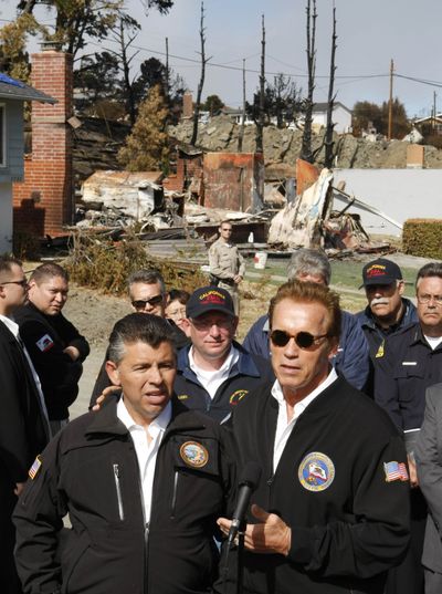  Gov. Arnold Schwarzenegger and Lt. Gov. Abel Maldonado speak at  the site of the explosion.  (Associated Press)
