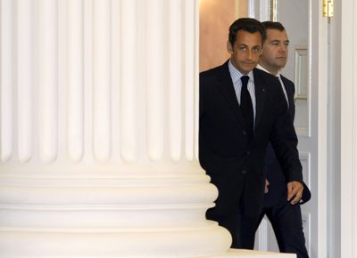 French President Nicholas Sarkozy, left, and Russian President Dmitry Medvedev arrive at a news conference at the Kremlin in Moscow on Tuesday.  (Associated Press / The Spokesman-Review)