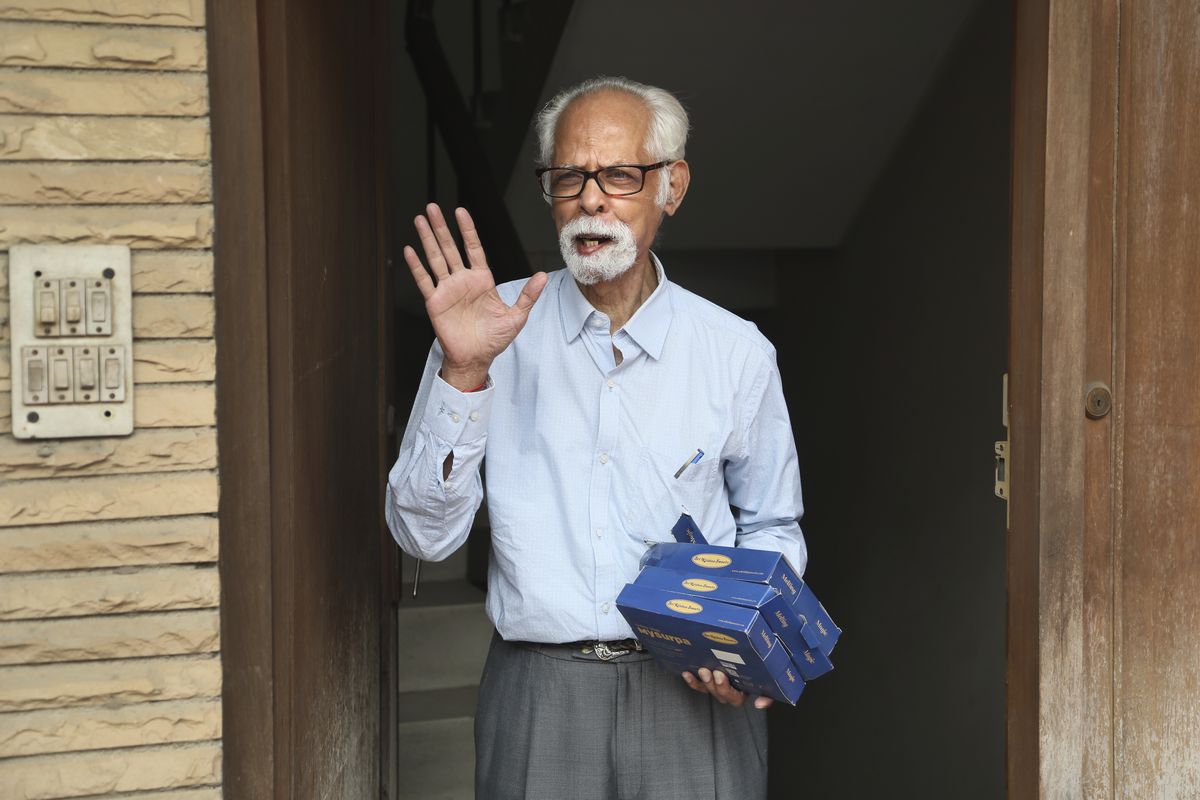 Vice President Kamala Harris’ maternal uncle, Balachandran Gopalan, talks to media outside his house Nov. 8, in New Delhi, India. (Manish Swarup)