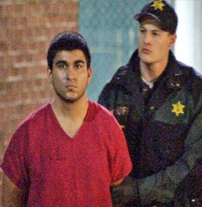 This image from video by KIRO7 shows suspected Cascade Mall shooter Arcan Cetin arriving at the Skagit County Jail in Mount Vernon, Washington, after his arrest in Oak Harbor, Washington, Saturday evening. (Jeff Ritter / AP)