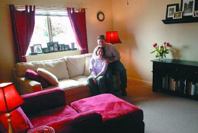 
Sarah Beck and her husband 1st Lt. Matt Beck live in a two-bedroom home on Fairchild Air Force Base.  The Becks used bold colors, dark woods and chrome and glass accents to give their living space a  distinctly urban feel. 
 (photos by Holly Pickett/the spokesman-review / The Spokesman-Review)