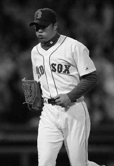 
Hideki Okajima gives the Red Sox an extra boost out of the bullpen. 
 (Associated Press / The Spokesman-Review)