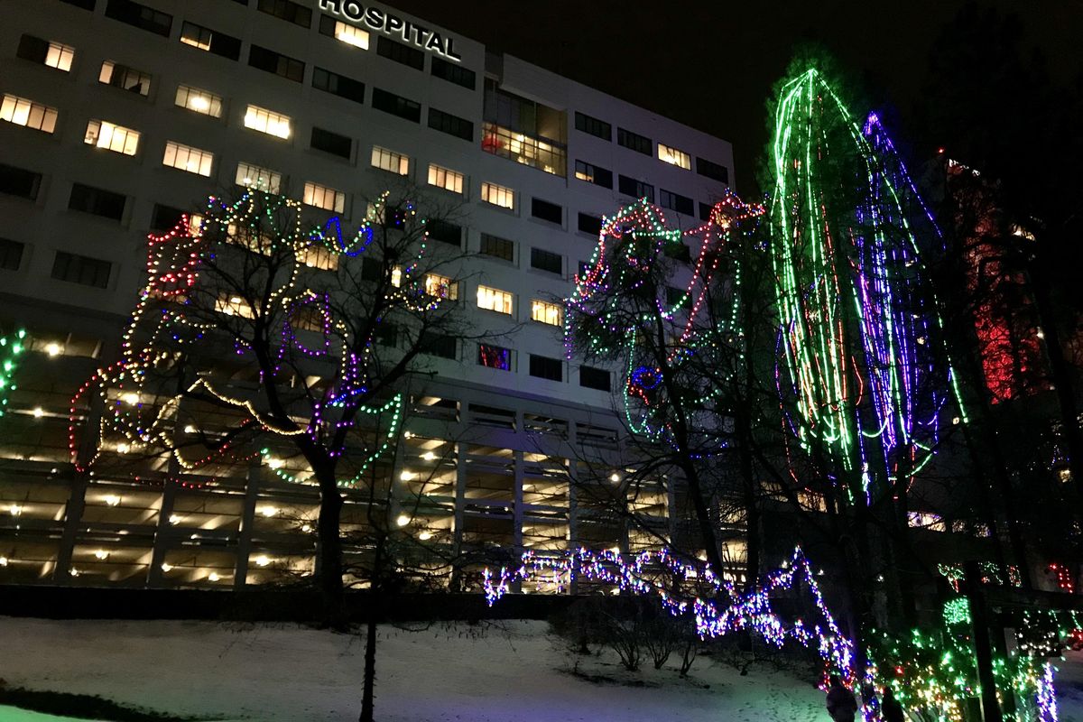 Lights decorate the trees in Cowley Park across from Sacred Heart Medical Center. (Kimberly Lusk/The Spokesman-Review)