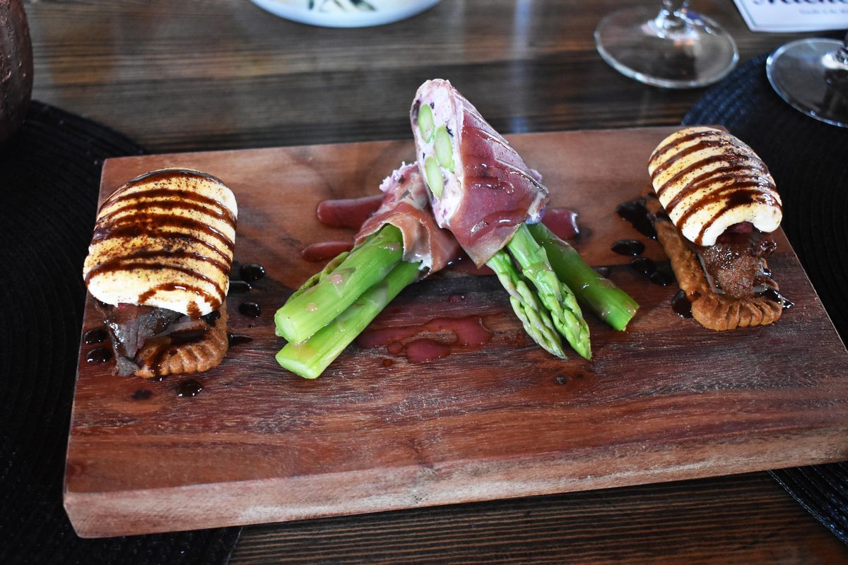 Signature steak s’mores and asparagas wrapped with proscuitto at Candle in the Woods in Athol. (Don  Chareunsy / The Spokesman-Review)