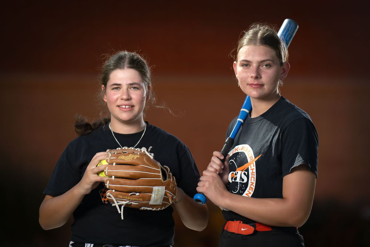 Lewis and Clark slowpitch softball players Izzy Heister, left, and Vienna Klein at Hart Field.  (Colin Mulvany/The Spokesman-Revi)