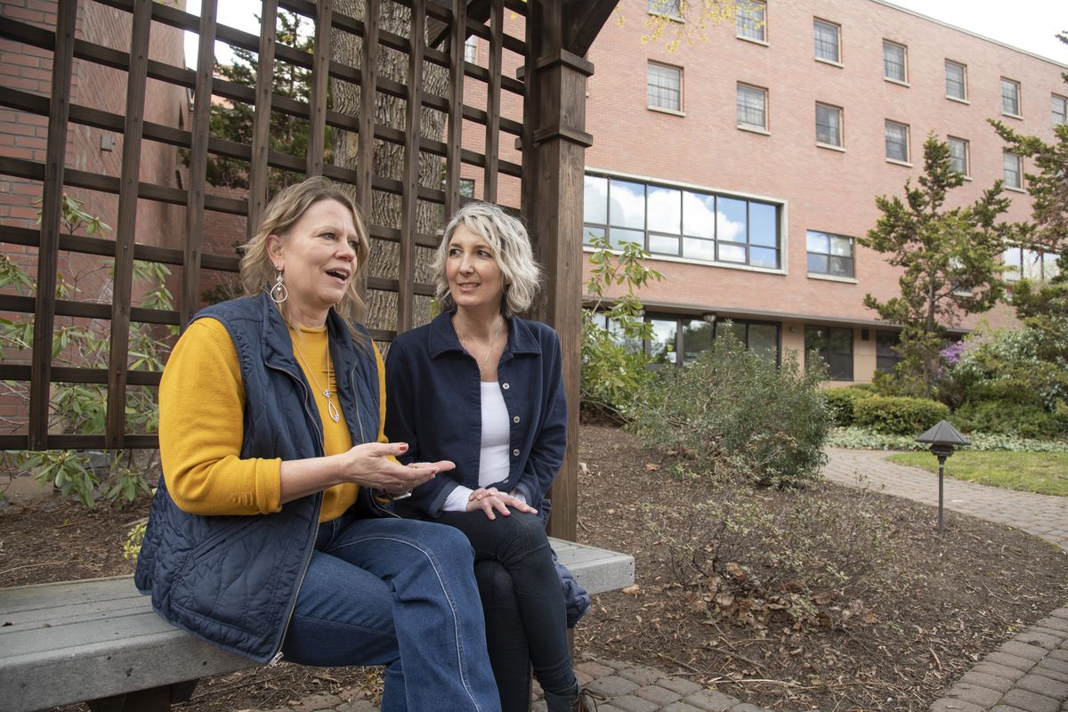 Marianne Nichols sits with friend and co-worker Jill Shacklett and talks about why she plans to donate a kidney to Shacklett on April 19 while in the Healing Garden at Providence Sacred Heart Medical Center. Nichols is the County Auditor of Pend Oreille County and Shacklett has worked in her office for many years. In order to get approved for the donation, Nichols had to transfer Shacklett to another county department. (Jesse Tinsley/The Spokesman-Review)