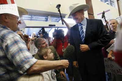 
Fred Thompson arrives at the Enterprise Jet Center for a short rally before making his way to a July fundraiser  in Houston. Associated Press
 (File Associated Press / The Spokesman-Review)