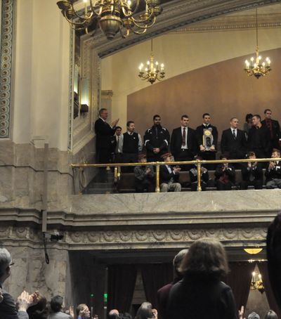 Members of  the EWU Eagles football team stand for applause from the House of Representatives and members of the gallery. (Jim Camden/staff writer)