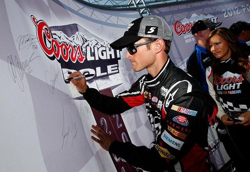 Kasey Kahne, driver of the #5 HendrickCars.com Chevrolet, signs the wall after qualifying for the pole position in the NASCAR Sprint Cup Series Good Sam Roadside Assistance 500 at Talladega Superspeedway on October 6, 2012 in Talladega, Alabama. (Photo by Tom Pennington/Getty Images) (Tom Pennington / Getty Images North America)