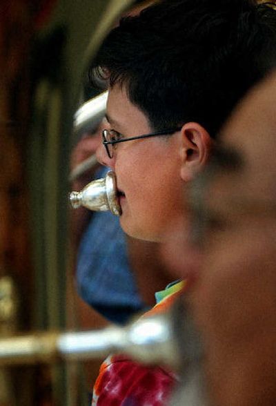 
Dyllan Porter plays his tuba with the SFCC  Concert  Band. 
 (The Spokesman-Review)