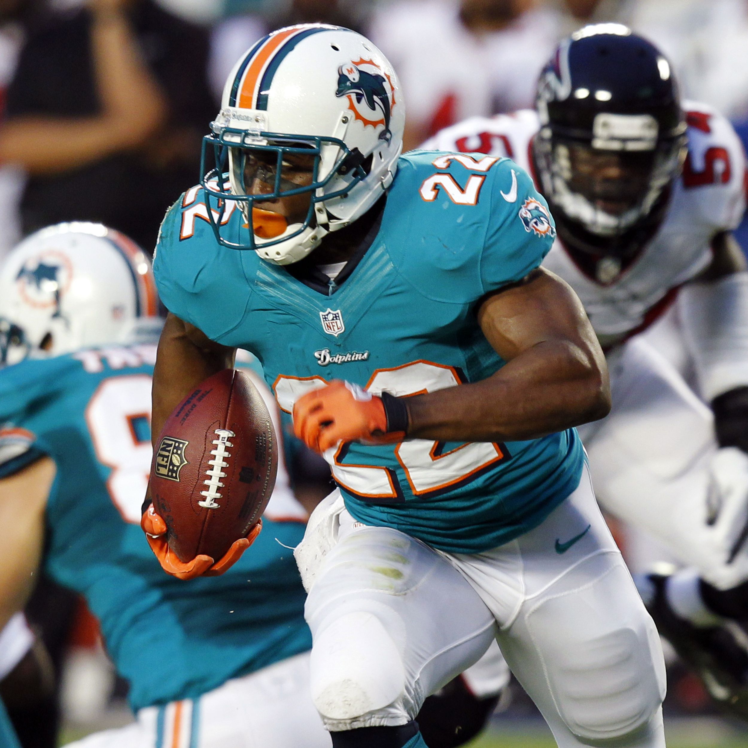 Reggie Bush big fish for Dolphins