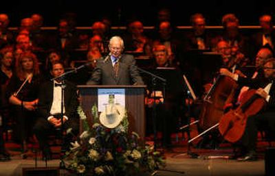 
Former Idaho Gov. Phil Batt speaks during a memorial service for J.R. Simplot at Quest Arena in Boise on Sunday.  Simplot, a billionaire best known for providing McDonald's Corp. with its frozen french fries, died May 25 at his Boise home at age 99. Photos by AP Photo/Idaho Statesman, Kerry Maloney
 (Photos by AP Photo/Idaho Statesman, Kerry Maloney / The Spokesman-Review)