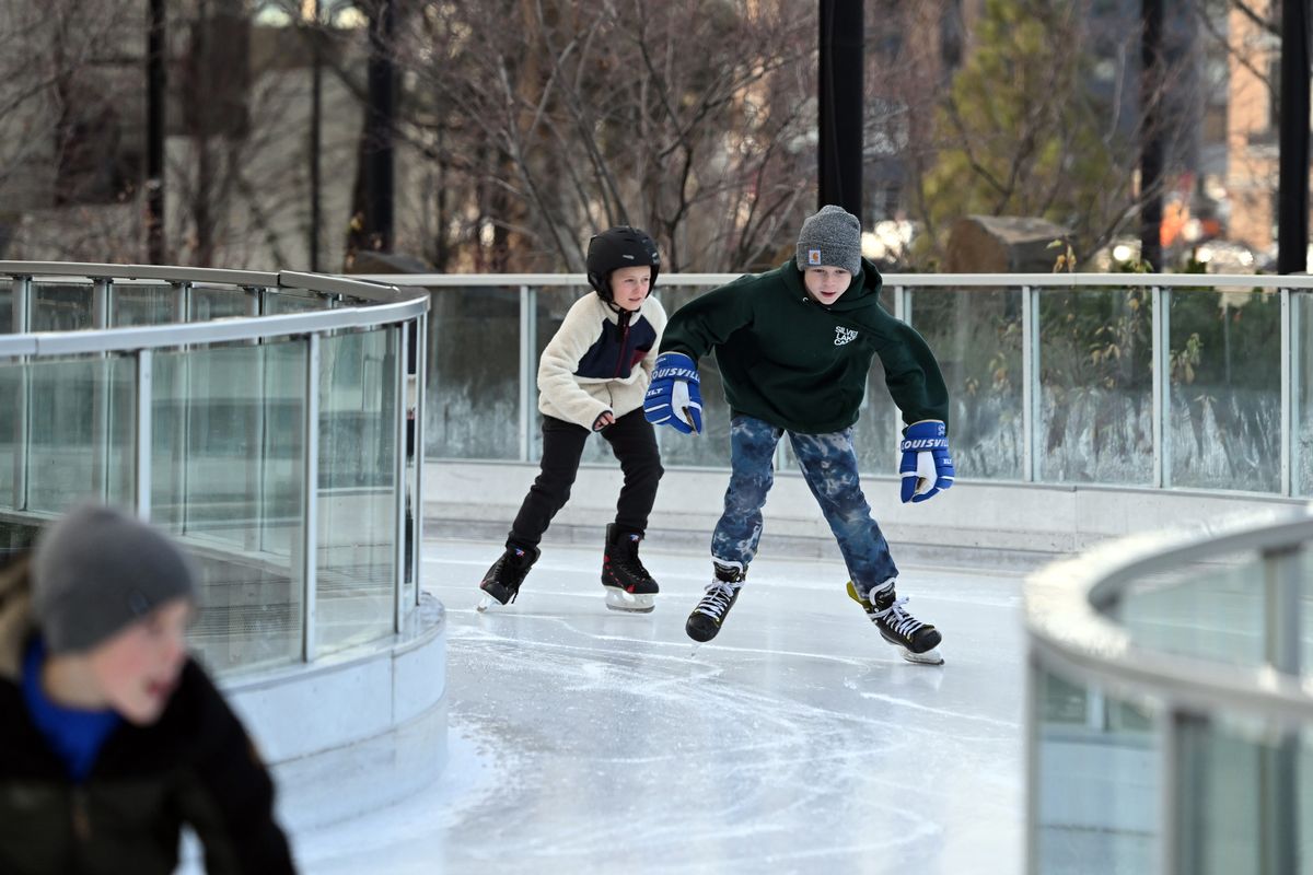 Kids, out of school for the holiday break, race onto the ice at the Numerica Skate Ribbon Monday, Dec. 29, 2025 at Riverfront Park in downtown Spokane. (Jesse Tinsley/THE SPOKESMAN-REVI)