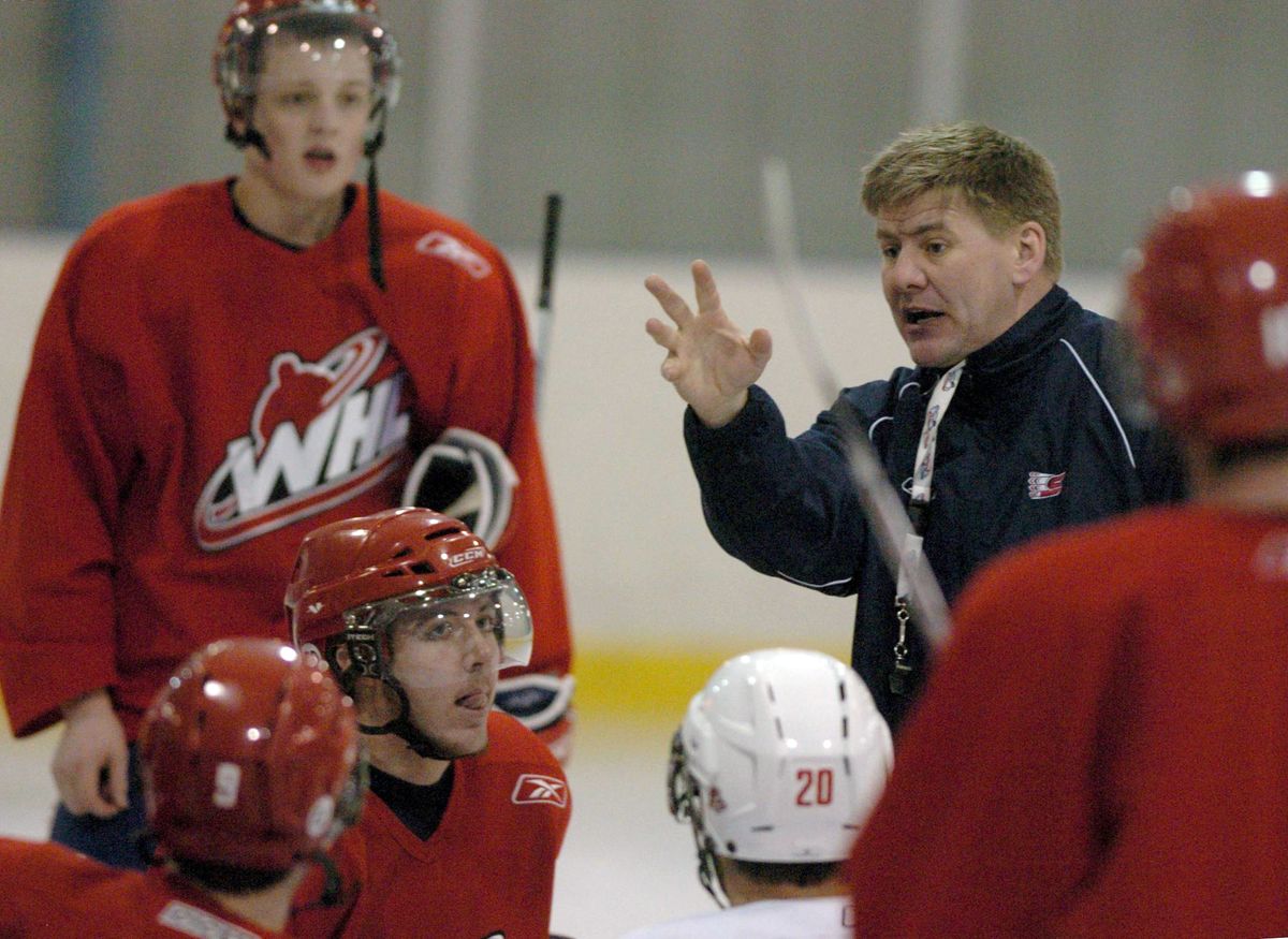 Bill Peters will ply his coaching skills with the Rockford IceHogs of the AHL this season. (File / The Spokesman-Review)