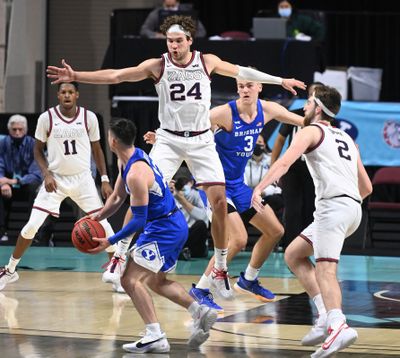 Gonzaga’s Corey Kispert blocks a passing lane against BYU’s Alex Barcello during the second half of the West Coast Conference Tournament championship March 9 at the Orleans Arena in Las Vegas.  (Associated Press)