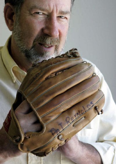 
Patrick Reynolds holds his baseball glove. His brother found the glove, missing for 42 years, in a flea market box and reunited the pair.
 (Los Angeles Times / The Spokesman-Review)