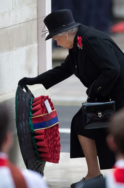 Britain’s Queen Elizabeth II lays a wreath during the service of remembrance at the Cenotaph in London. (Associated Press)