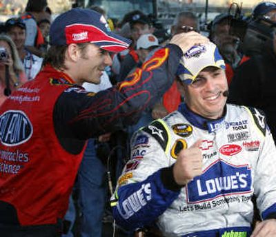 
The way Jimmie Johnson, right, has been racing in NASCAR's Chase for the Cup, Jeff Gordon may be rubbing his head for good luck. Associated Press
 (Associated Press / The Spokesman-Review)