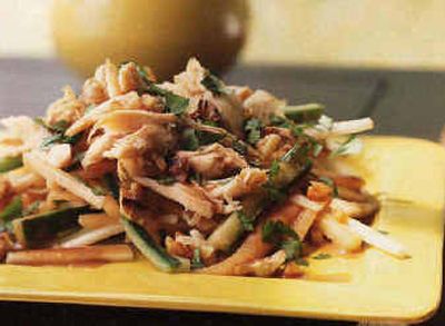 
Melon Chicken Salad combines flavors of honey, soyu, vinegar and daikon.
 (Associated Press / The Spokesman-Review)