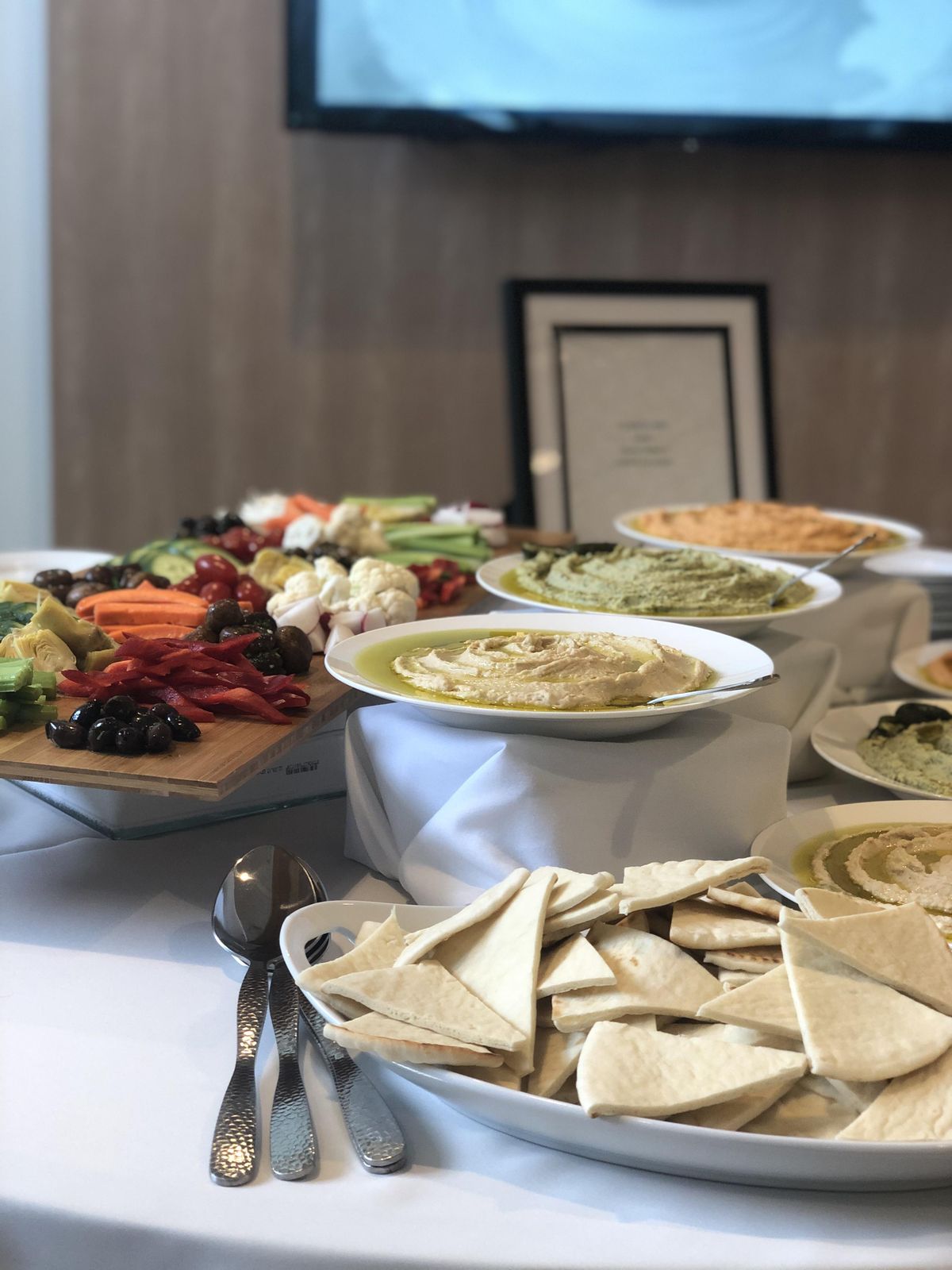 Celebrity chef Beau MacMillan created the menu for the restaurants at Revel Spokane retirement community. This hummus platter was featured at the retirement community’s grand opening celebration. (Courtesy photo / Revel Spokane)