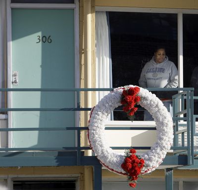 In Jan. 19, 2009, file photo, a woman looks out of a window while visiting the National Civil Rights Museum located at the Lorraine Motel in Memphis, Tenn., on the nationwide holiday honoring Martin Luther King Jr. (Mark Humphrey / Associated Press)