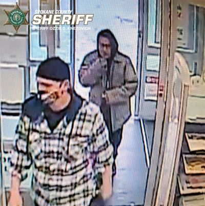 Spokane Valley deputies are searching for these two men who are suspects in an alleged robbery Friday morning at Walgreens.  (Courtesy of Spokane County Sheriff's Office)