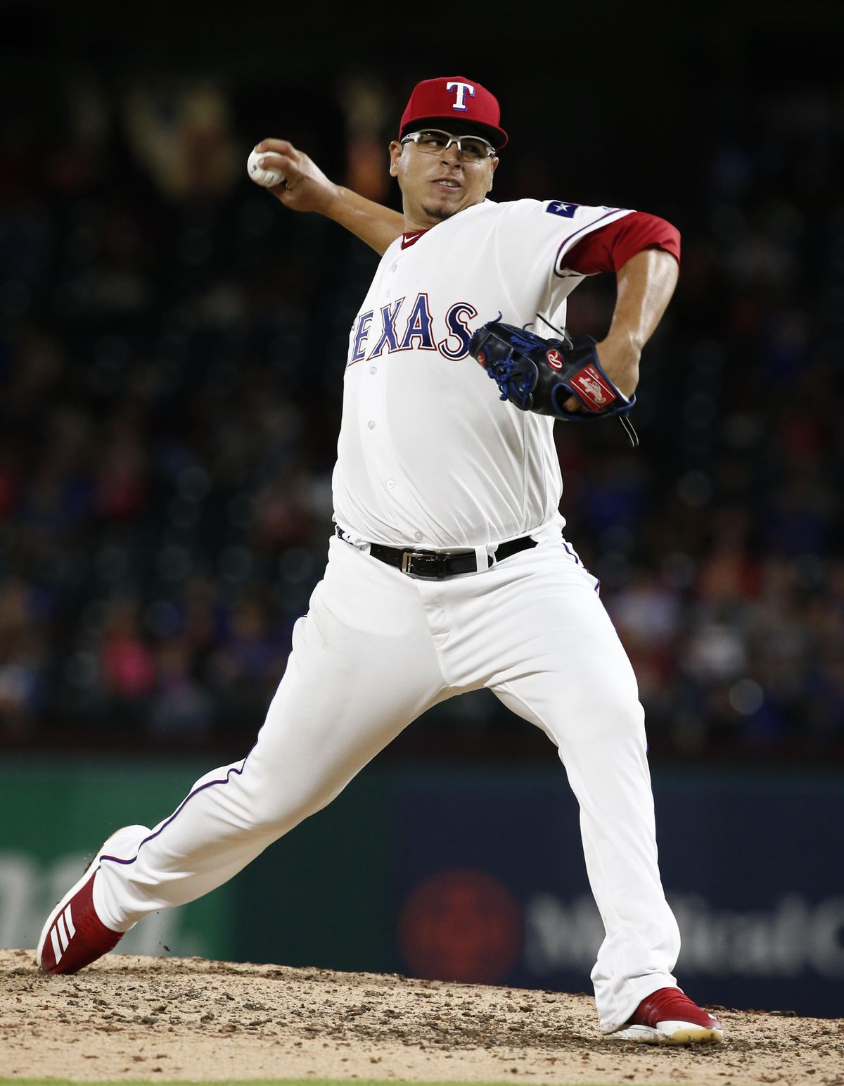 Texas Rangers pitcher Ariel Jurado delivers against the Seattle Mariners during the sixth inning  Friday  in Arlington, Texas. (Mike Stone / AP)