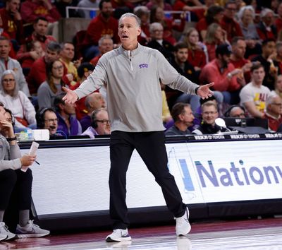 Head coach Jamie Dixon of the TCU Horned Frogs argues a call by the officials in the second half against the Iowa State Cyclones at Hilton Coliseum in Ames, Iowa.  (Tribune News Service)