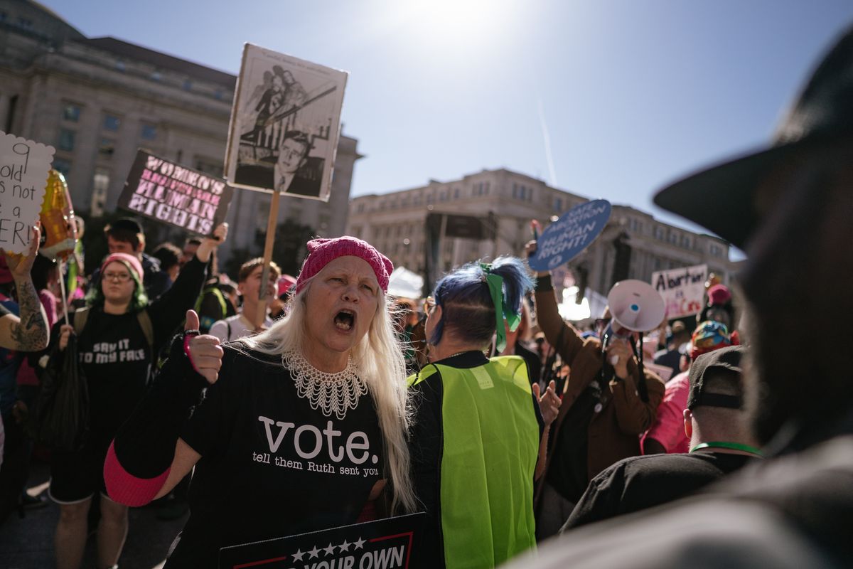 Protester Barbara McKinney, 63, shouts at counterprotesters at the Women’s March at Freedom Plaza on Saturday in Washington, D.C.  (Jordan Tovin/For The Washington Post)