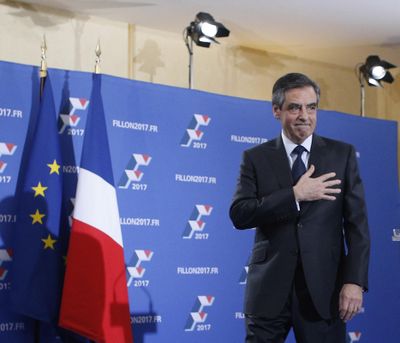 Francois Fillon acknowledges applauses before delivering a speech after the official announcement of results in the conservative party’s national primary election in Paris, France, Sunday, Nov. 27, 2016 in Paris. (Thibault Camus / Associated Press)