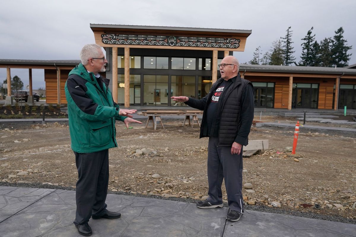 W. Ron Allen, right, chairman of the Jamestown S