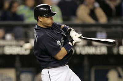 
Kenji Johjima swings and misses for the final out.Associated Press
 (Associated Press / The Spokesman-Review)