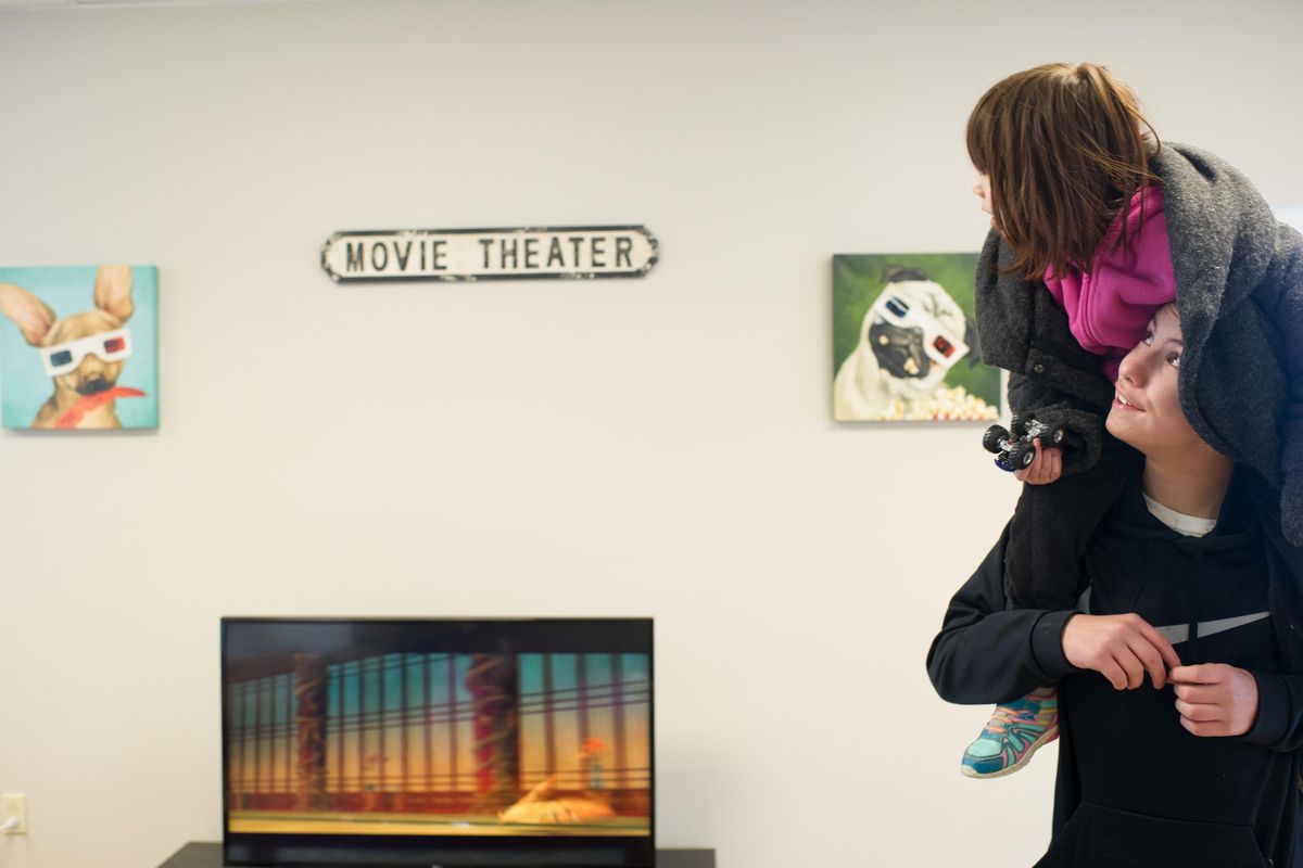 Joe Hamner and his sister Sara take in the new Family Promise shelter which serves homeless families on Thursday, Feb. 23, 2017, in Spokane, Wash. (Tyler Tjomsland / The Spokesman-Review)